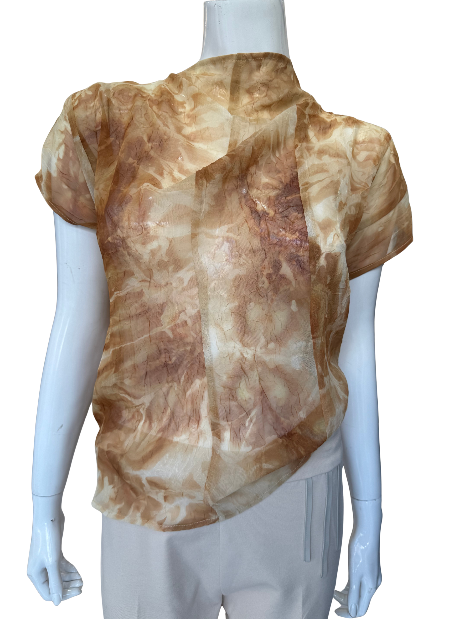 Front view of striking watercolor print blouse in camel tones featuring abstract artistic pattern with flowing chiffon overlay and cap sleeves creating sophisticated visual depth