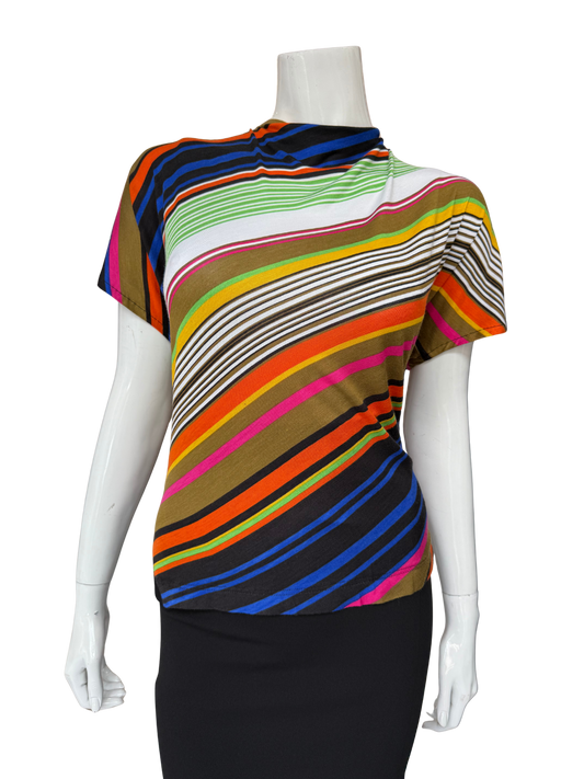 Front view of multi-stripe asymmetrical tee featuring vibrant blues, greens, oranges and pinks in flowing diagonal pattern with modern neckline and statement design