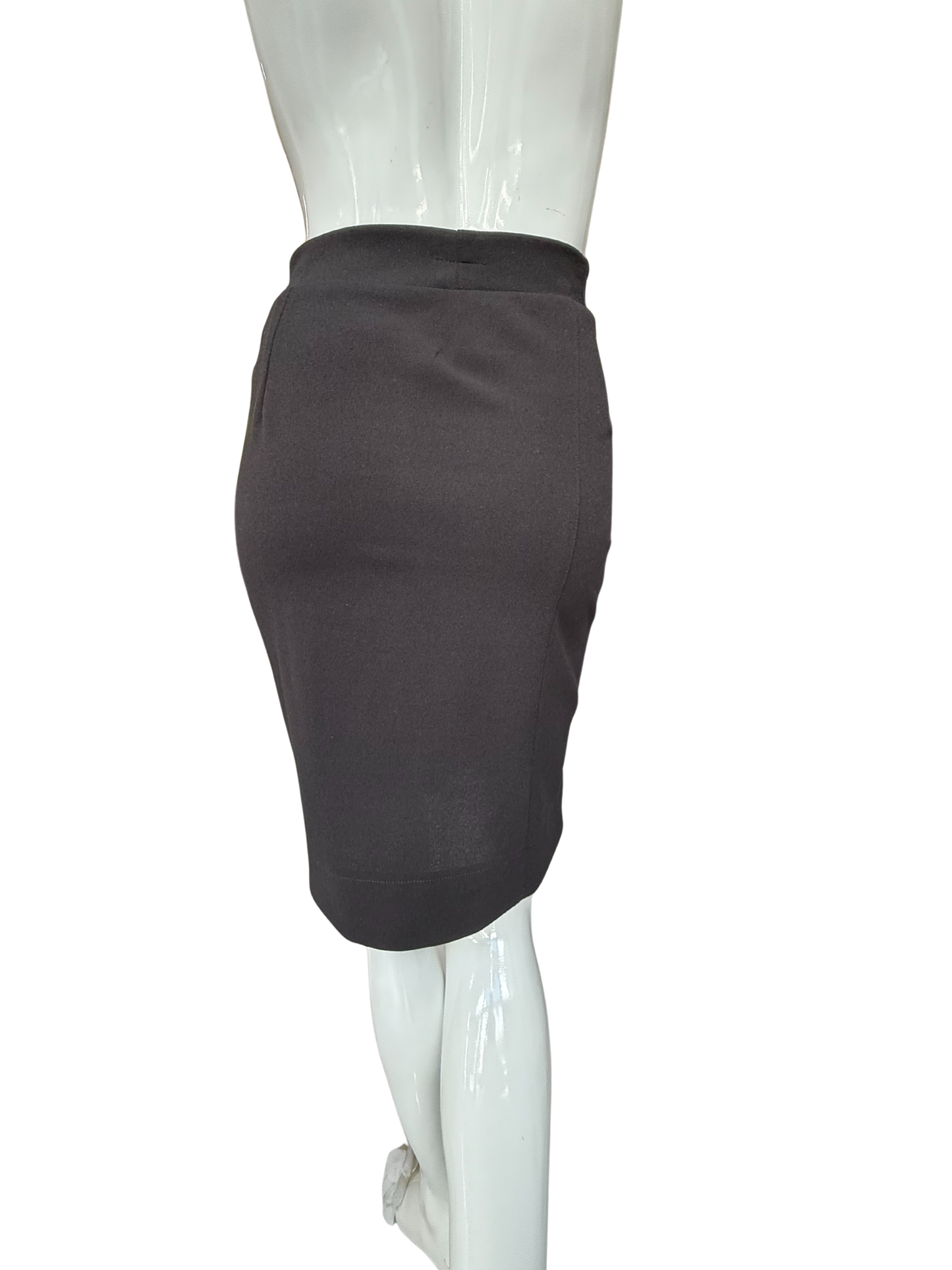 Back view of black pencil skirt displaying sleek tailoring and high waistband with quality stretch fabric construction and sophisticated fit