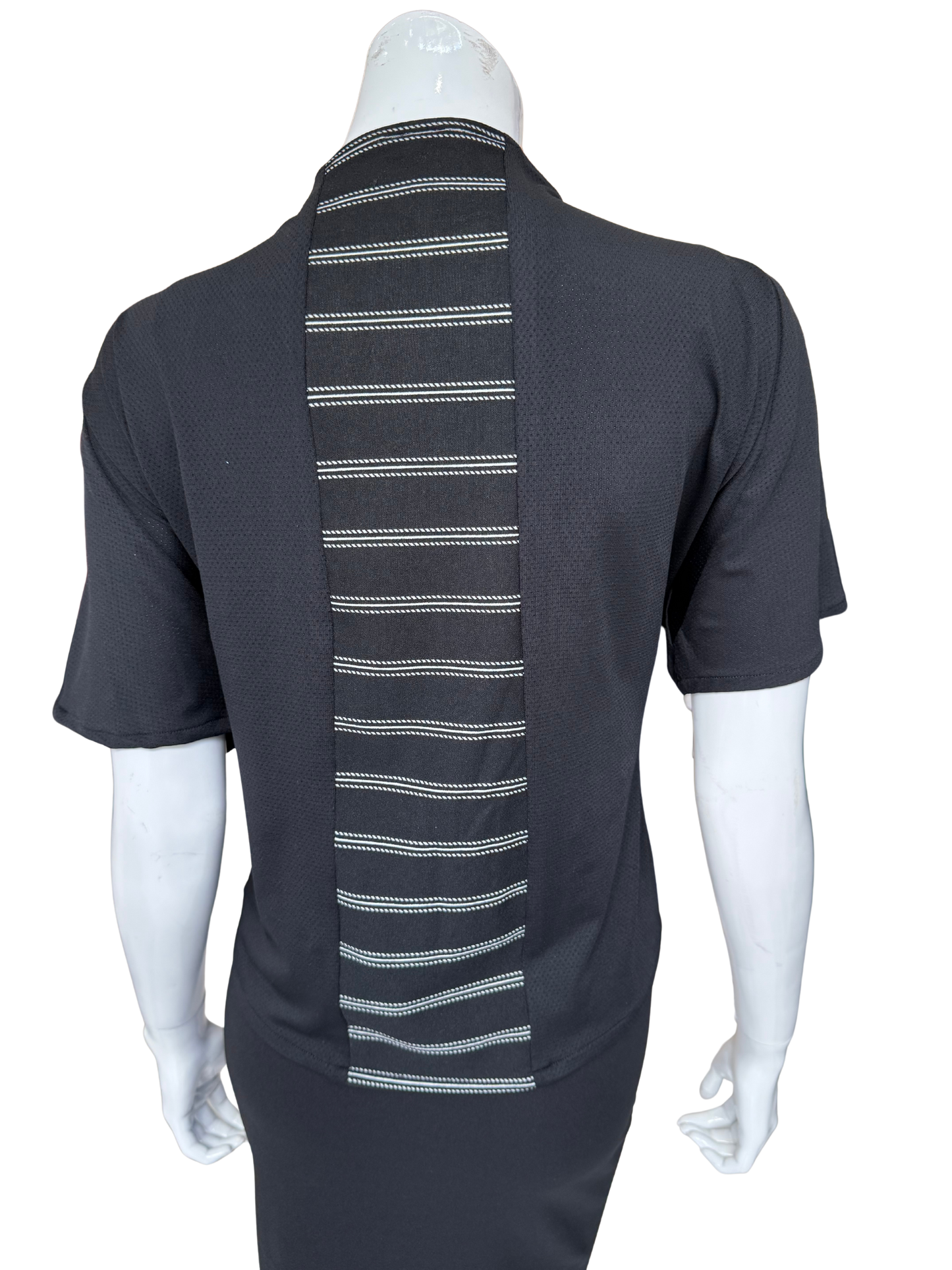 Back view of striking striped center knit top in charcoal showing vertical white striped panel detail and quality knit construction with short sleeves