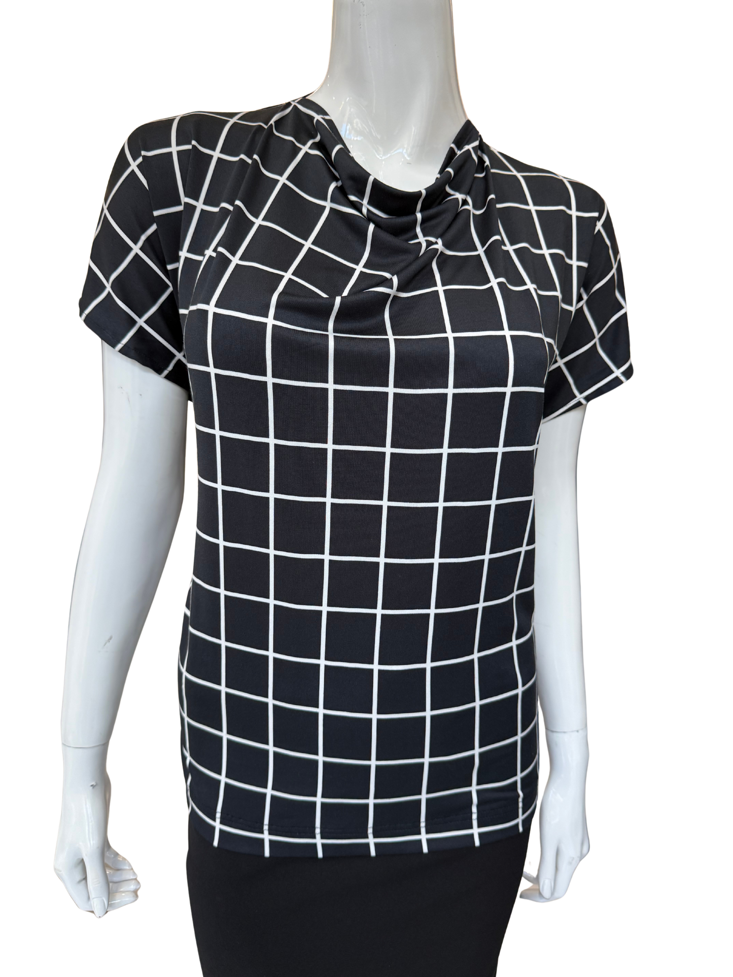 Front view of quality cowl neck top in black and white grid print featuring distinctive tie detail and cap sleeves with modern geometric pattern