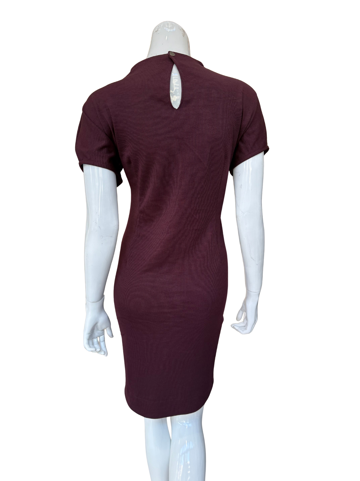 Back view of burgundy ribbed knit dress showing keyhole detail and quality textured fabric construction with sophisticated modern appeal
