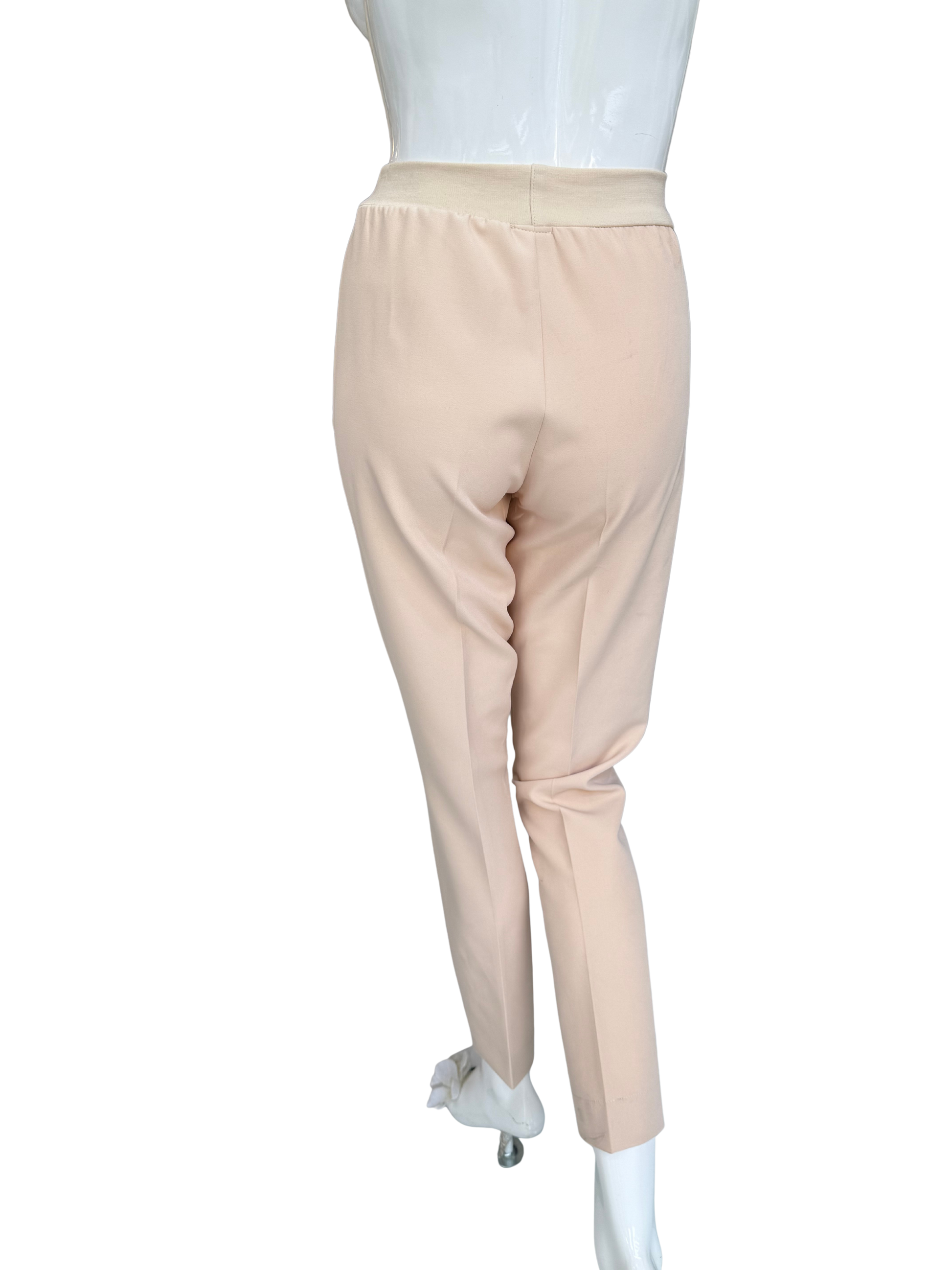 Back view of tan stretch crepe pants showing streamlined fit and quality construction with comfortable waistband and sophisticated tailoring
