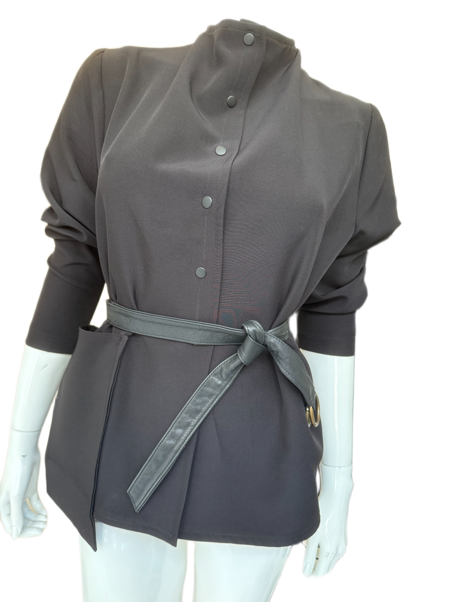 Contemporary calf leather wrap belt with gold hardware styled around charcoal jacket, showing modern silhouette definition