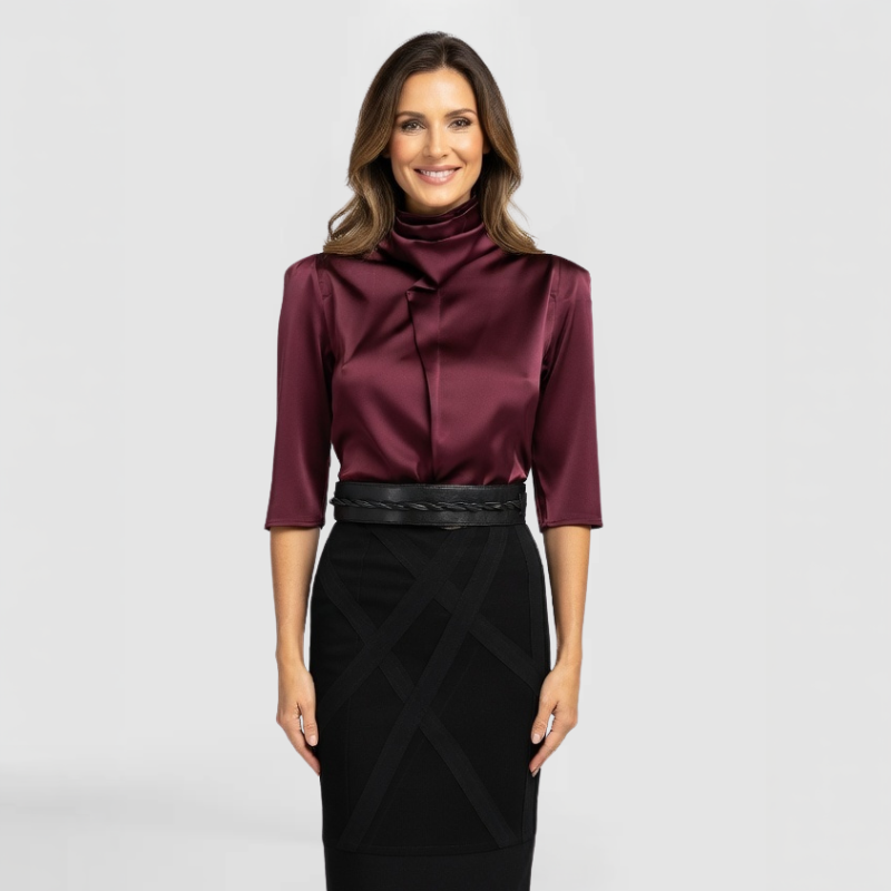 The Sonja Top, by New York Fashion Designer SWABY - a luxurious burgundy top with mock cowl emphasizing attention and distinction.