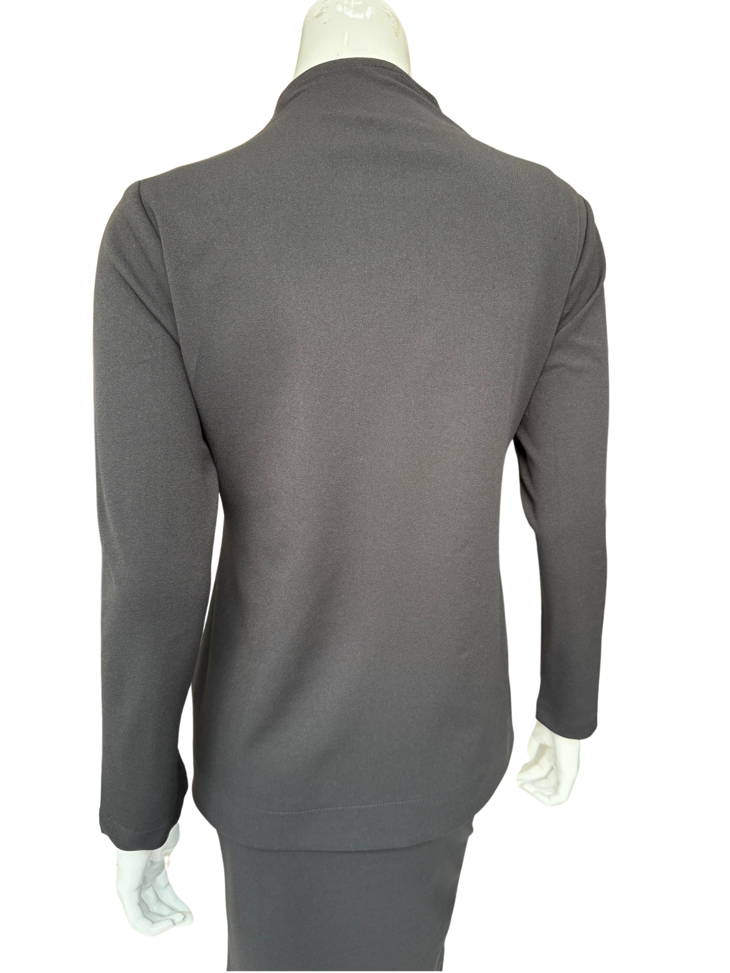 Back view of charcoal knit crepe lapel jacket showing contemporary tailoring and clean lines in premium fabric construction