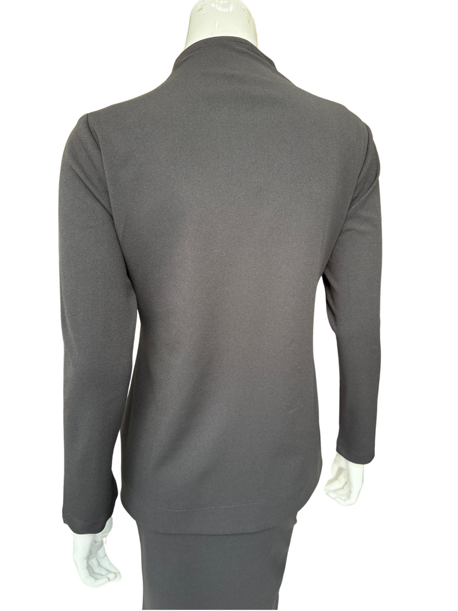 Back view of charcoal knit crepe lapel jacket showing contemporary tailoring and clean lines in premium fabric construction