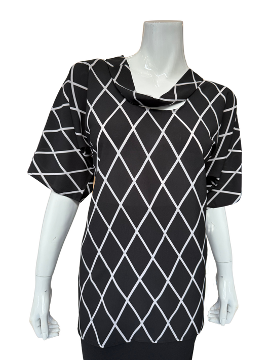 Front view of modern stretch chiffon blouse in black and white diamond lattice print featuring cowl neckline and 3/4 sleeves with geometric pattern