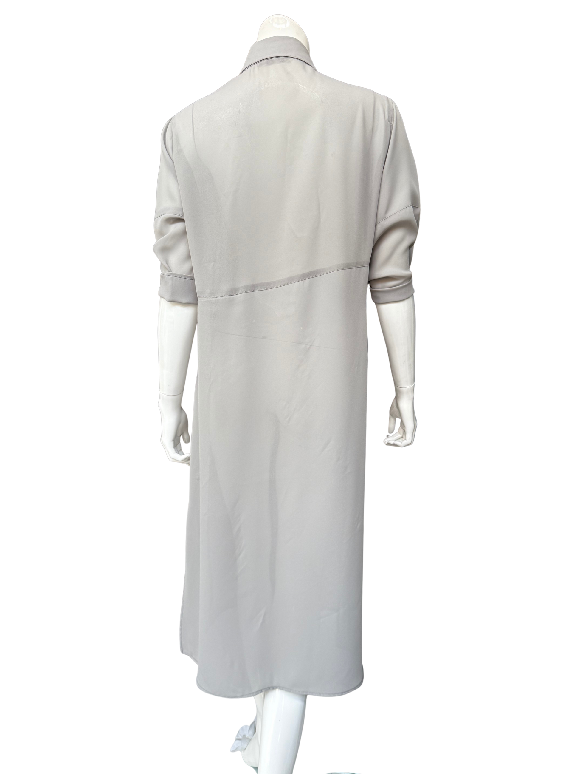 Back view of pale gray Knox Top georgette blouse on mannequin showing long shirt-dress silhouette with subtle side slits and flowing drape