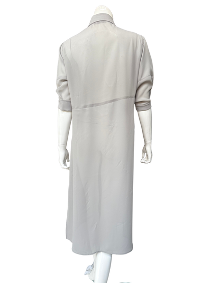 Back view of pale gray Knox Top georgette blouse on mannequin showing long shirt-dress silhouette with subtle side slits and flowing drape
