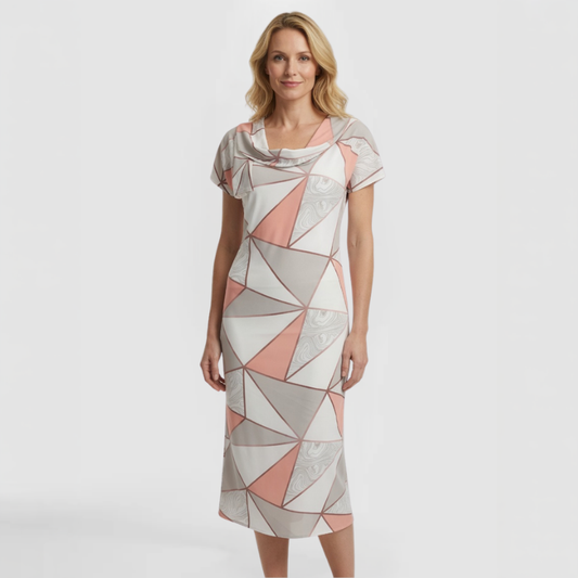 Short-sleeve midi-length dress in geometric triangle print of soft pink, gray, and white with marbled texture, scoop neckline, and relaxed fit. Made by SWABY - A Chicago Fashion Designer.