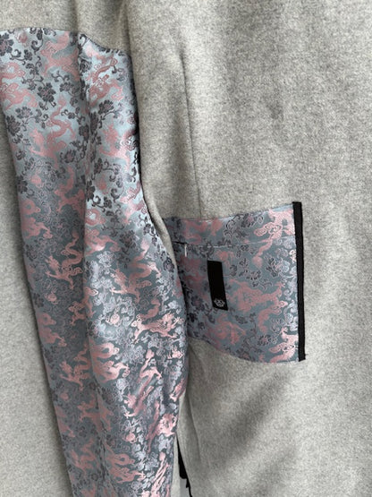 A view of the inside zip pocket of the Elyse Coat