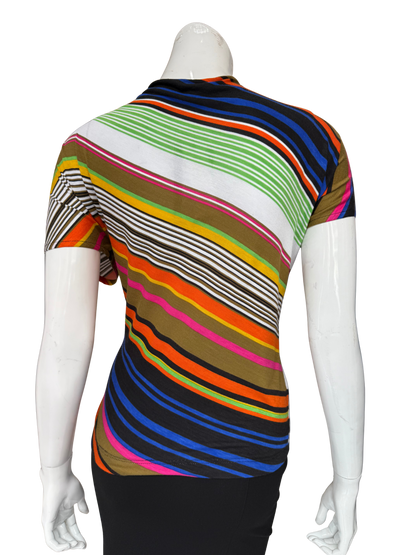 Back view of vibrant multi-stripe tee showing dynamic diagonal pattern in bold colors with asymmetrical design and cap sleeve construction
