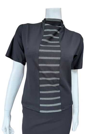 Front view of black striped center top featuring asymmetrical neckline with tie detail and distinctive vertical panel creating modern visual interest and sophisticated appeal