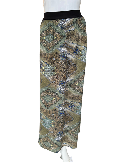 Side view of distinctive paisley print maxi skirt in multi-color georgette showing flowing floor-length silhouette and intricate pattern detail with comfortable black waistband