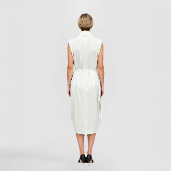 A view of the back of the Nyson Dress - a white sleeveless shirt-style dress