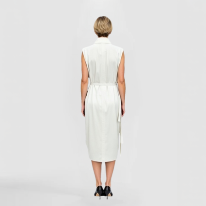 A view of the back of the Nyson Dress - a white sleeveless shirt-style dress