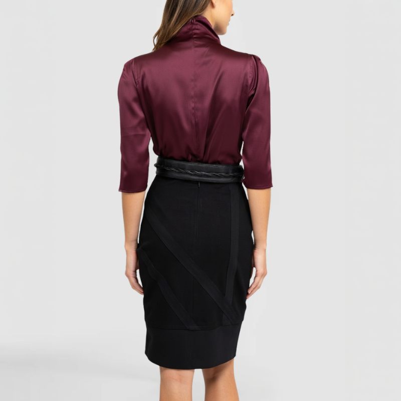 The back side of the Sonja Top, by New York Fashion Designer SWABY - a luxurious burgundy top with mock cowl emphasizing attention and distinction.