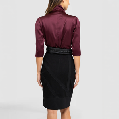 The back side of the Sonja Top, by New York Fashion Designer SWABY - a luxurious burgundy top with mock cowl emphasizing attention and distinction.