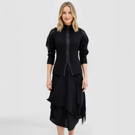 The Trinity Sweater, by SWAY - a New York Fashion Designer, shown here on a blonde fashion model featuring zip-front, hand-made surface lines and leather trim accents