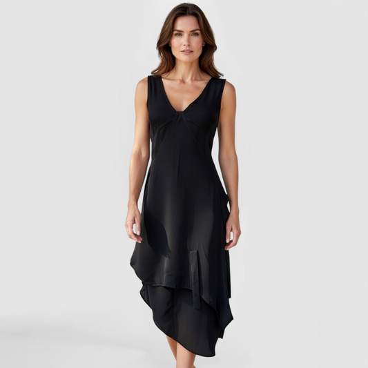 The SWABY Evie Dress shown from the front on a fashion model. A stlyish elegant dress that can be worn day or night.