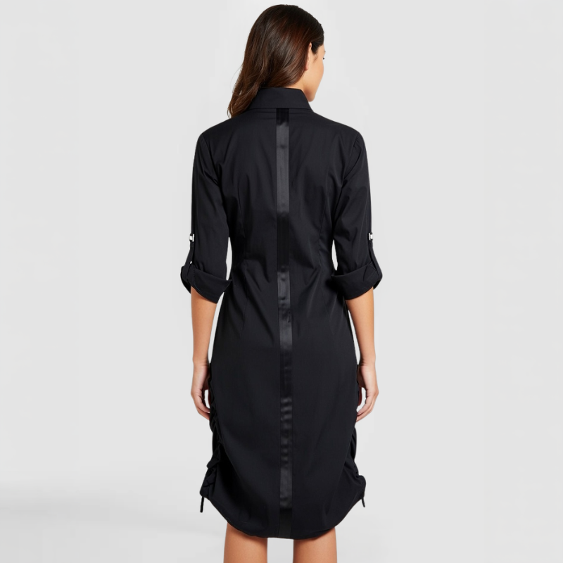 SWABY Nyson w/s Dress shown from the rear view. Note the leather strapping down the center of the back. The bottom of the dress can be lifted. The sleeves can be adjusted as needed.