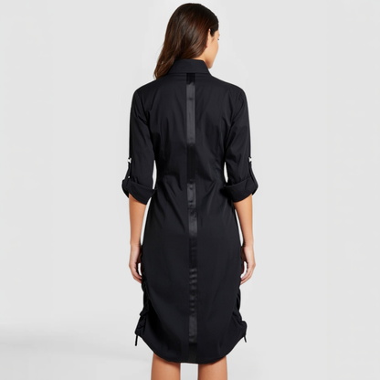 SWABY Nyson w/s Dress shown from the rear view. Note the leather strapping down the center of the back. The bottom of the dress can be lifted. The sleeves can be adjusted as needed.