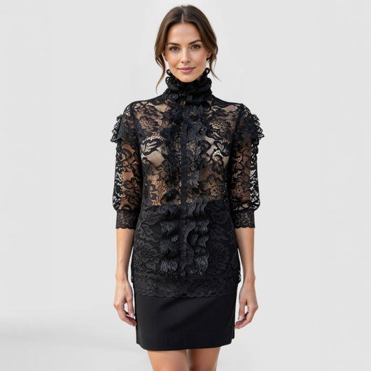 Front view of model wearing SWABY Shelby Top in black; high ruffled neckline, sheer floral lace long sleeves, structured body with lace overlay and ruffle detailing for luxurious, feminine comfort and understated elegance.