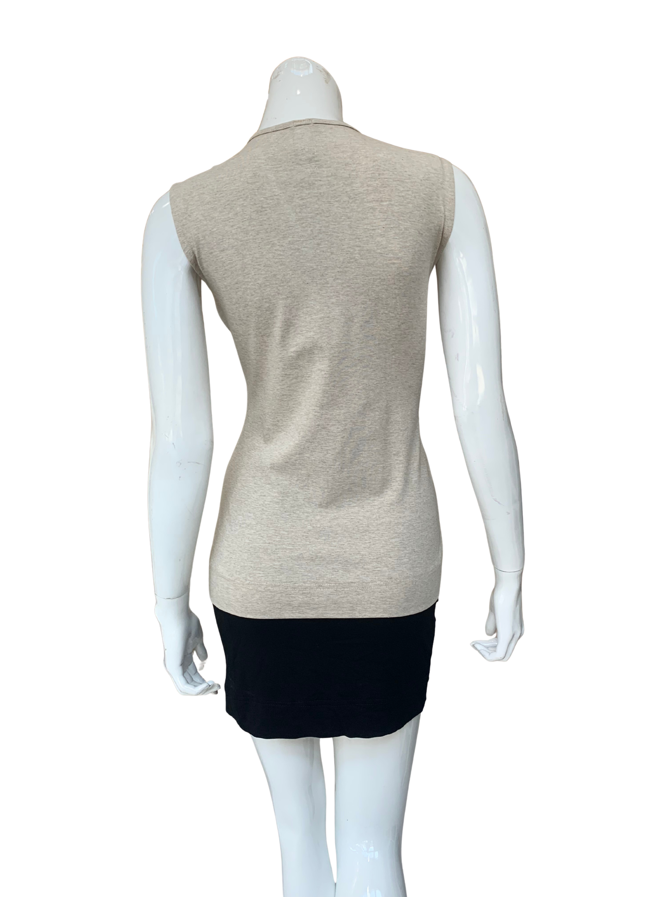 Rear view of a sophisticated sleeveless v-neck top in soft rayon Lycra knit demonstrating refined professional and everyday versatility